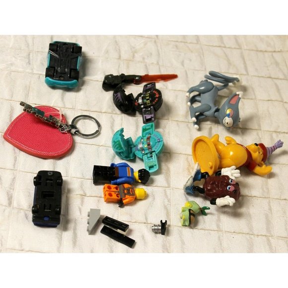 Miscellaneous Bag of Toys -12 Pooh Bear Lightning McQueen Light Saber Mr Raisin - Picture 9 of 12